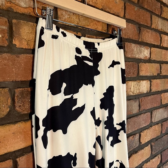 Black & White Cow Print Flare High Waisted Pants - Picture 3 of 3